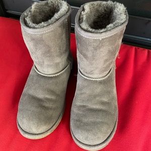 Grey UGG boots in original packaging
